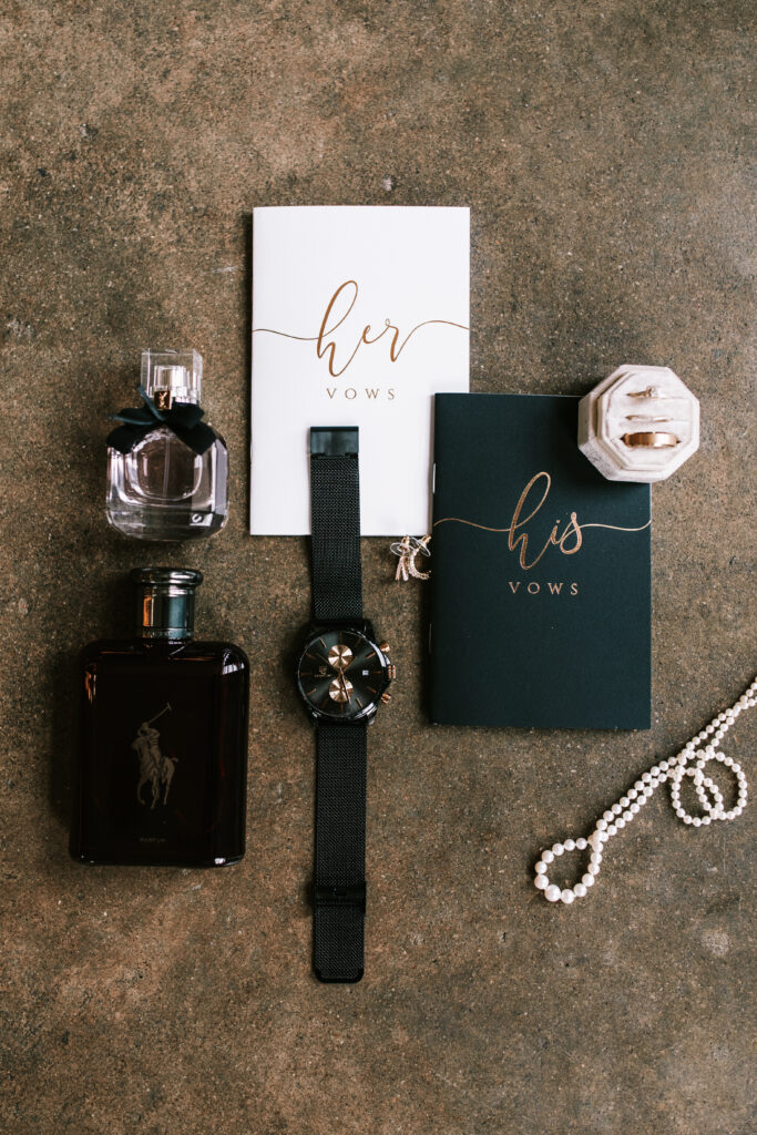 Vows, cologne, wedding rings, and a flat lay as part of a series of wedding detail shots by Missouri Wedding Photographer Bailey Morris. 