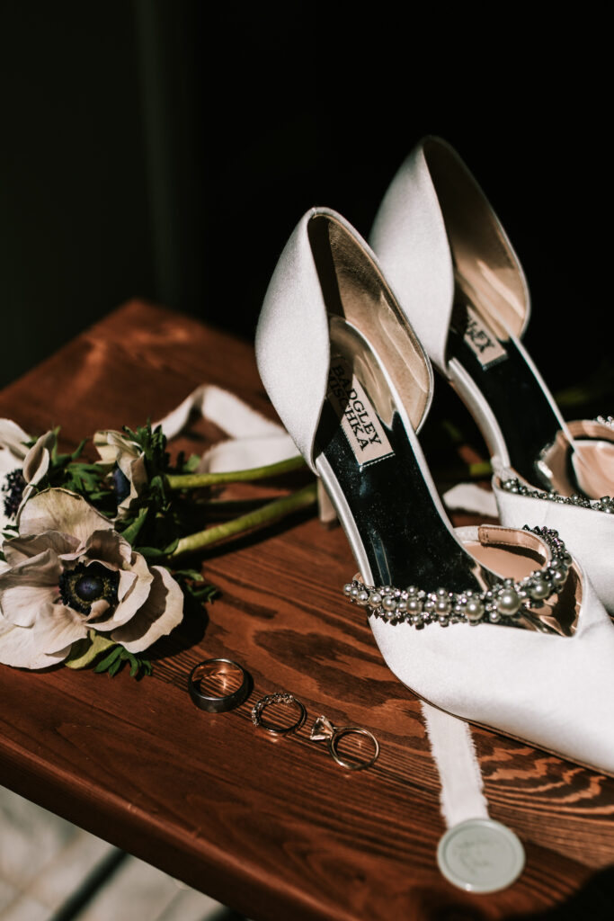 Bridal jewelry and shoes for black tie wedding at Finley Farms, a Springfield Missouri wedding venue
