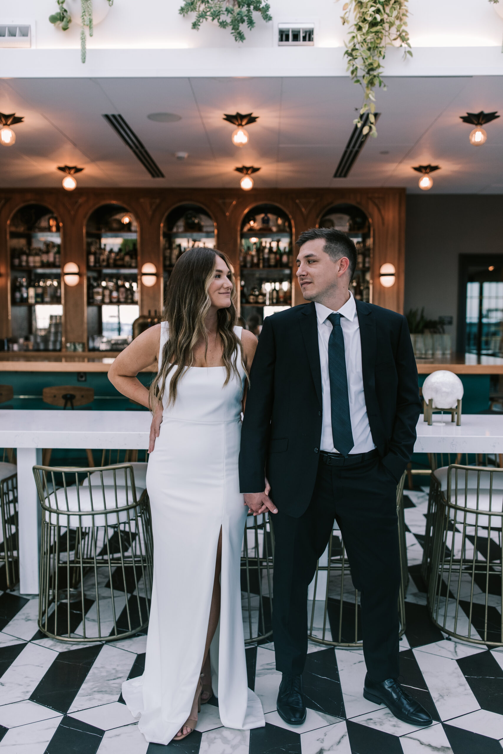 Bride and Groom portrait in the Vantage Rooftop Lounge and Conservatory in Springfield, Missouri at Hotel Vandivort.